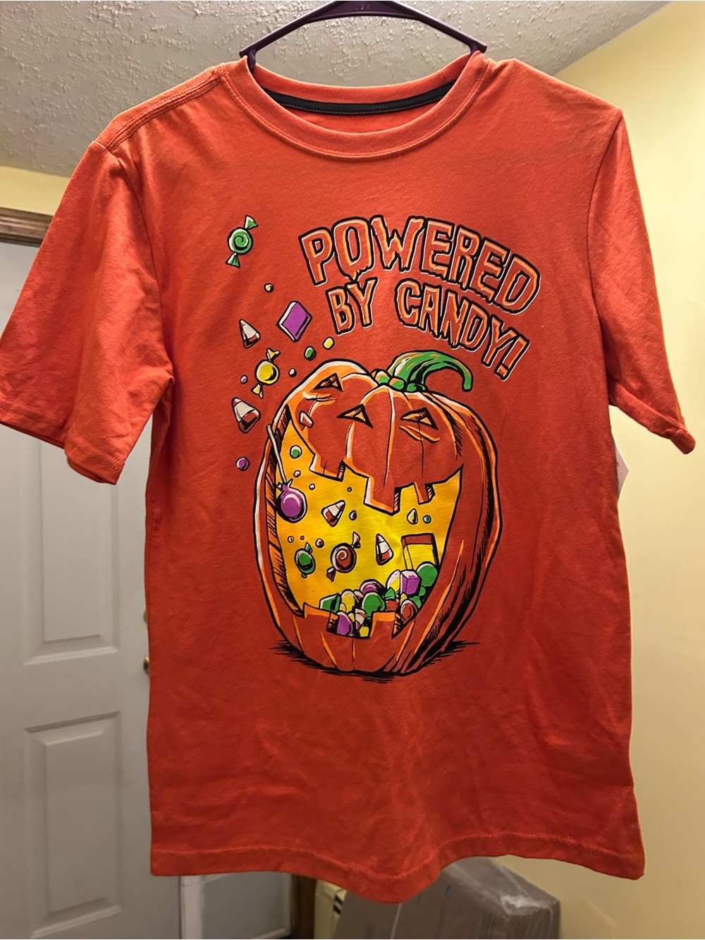 NWT Youth Orange 'Powered By Candy' Halloween Pumpkin Tee Cute Halloween T-shirt